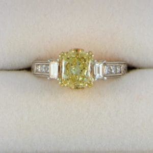 CroppedImage400400 Yellow dia engagement ring