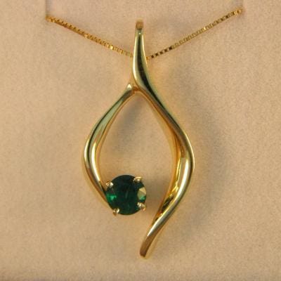 CroppedImage400400 emerald pendant .54ct