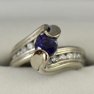Custom palladium wedding ring with round blue purple color change sapphire 5