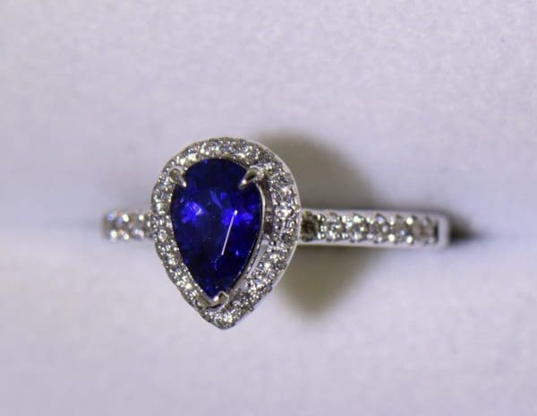 Blue Violet Pear Sapphire Halo Engagement Ring 5 outdoor.JPG