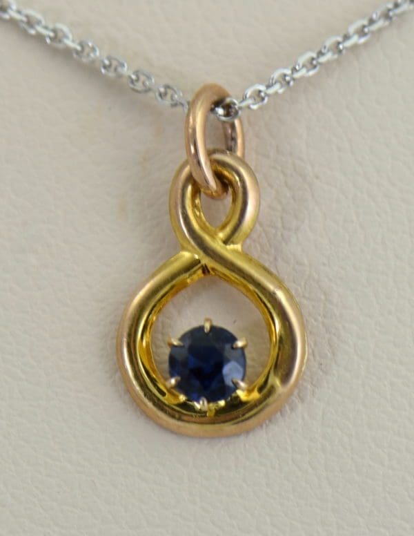 Edwardian Infinity Pendant with Round Blue Sapphire Pin Conversion.JPG