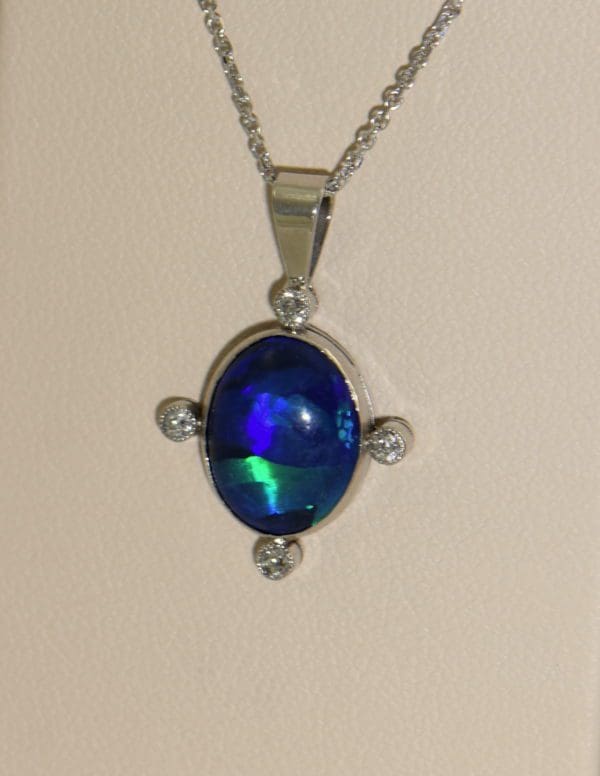 art deco platinum peacock black opal  diamond pendant 4 direct sunlight.JPG