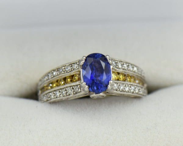 Violet Color Change Sapphire Ring with White Yellow Diamonds.JPG