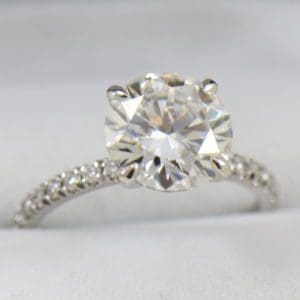 4ct moissanite solitaire engagement ring on thin diamond shank.JPG