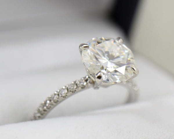 4ct moissanite solitaire engagement ring on thin diamond shank