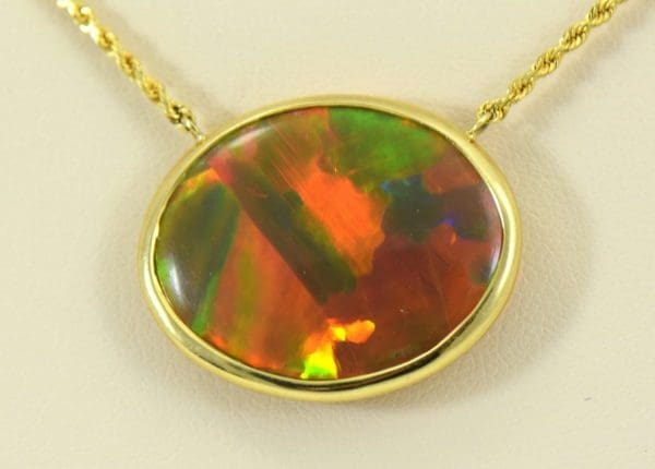 Amazing Reversible Brown base Ethiopian Opal Bezel Necklace in 14k yellow 2.JPG