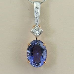 Kendra s Detachable Pendant with Princess Cut Diamond Oval Iolite.JPG