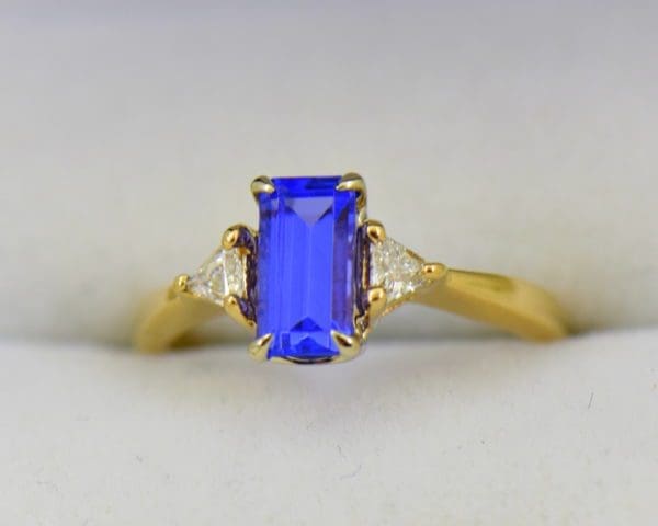 Petite Emerald Cut Tanzanite Trillion Diamond Yellow Gold Ring.JPG
