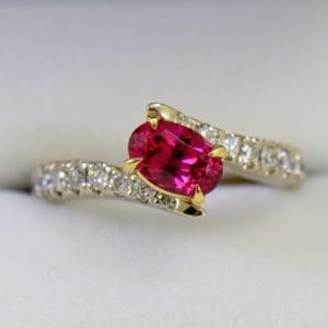 Burmese Neon Redish Pink Spinel set in white gold bypass ring.JPG