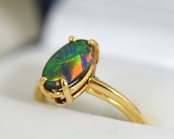 Chinese Writing Pattern Black Opal set in Orange Blossom Yellow Gold Solitaire circa 1930 2.JPG