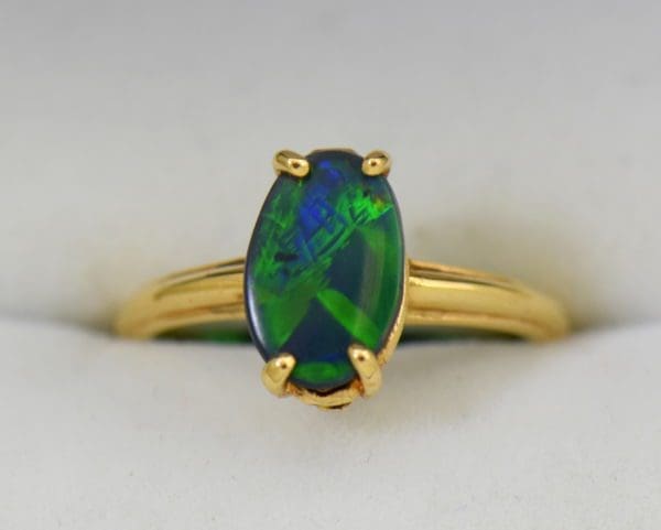 Chinese Writing Pattern Black Opal set in Orange Blossom Yellow Gold Solitaire circa 1930 3.JPG