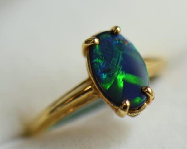 Chinese Writing Pattern Black Opal set in Orange Blossom Yellow Gold Solitaire circa 1930 8.JPG