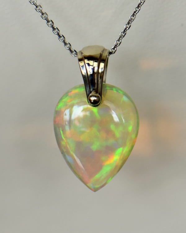 Ethiopian crystal opal bead pendant in white gold.JPG