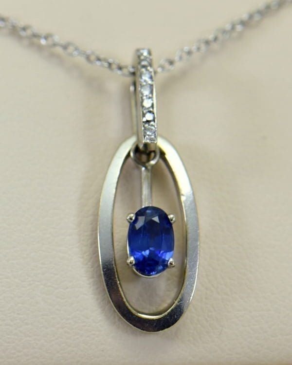 Modern Estate Oval Blue Sapphire Diamond Pendant with movable white gold frame.JPG