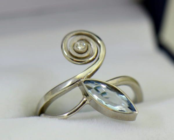 Modern Freeform Swirl Ring with Marquise Aquamarine in white gold.JPG