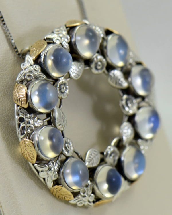 large 1930s floral wreath pendant with blue moonstones in sterling and 14k 2.JPG