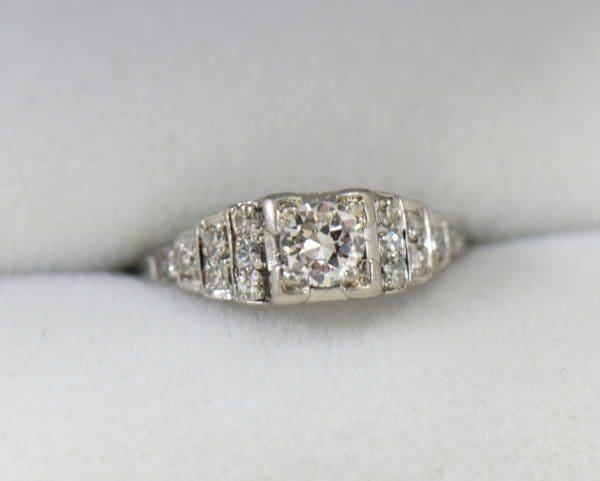 Art Deco .33ct platinum engagement ring with stair step diamond accents.JPG