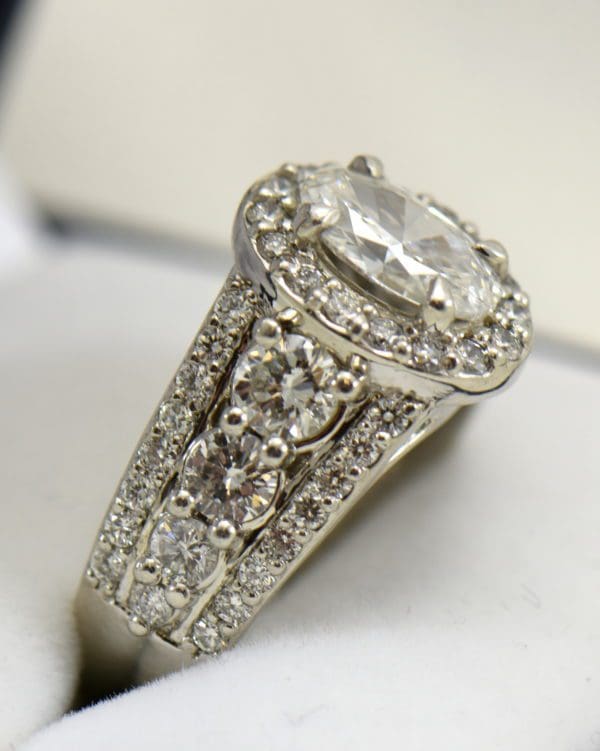 Susans 1.50ct Oval Diamond Platinum Halo Ring with 3 row Diamond Shank