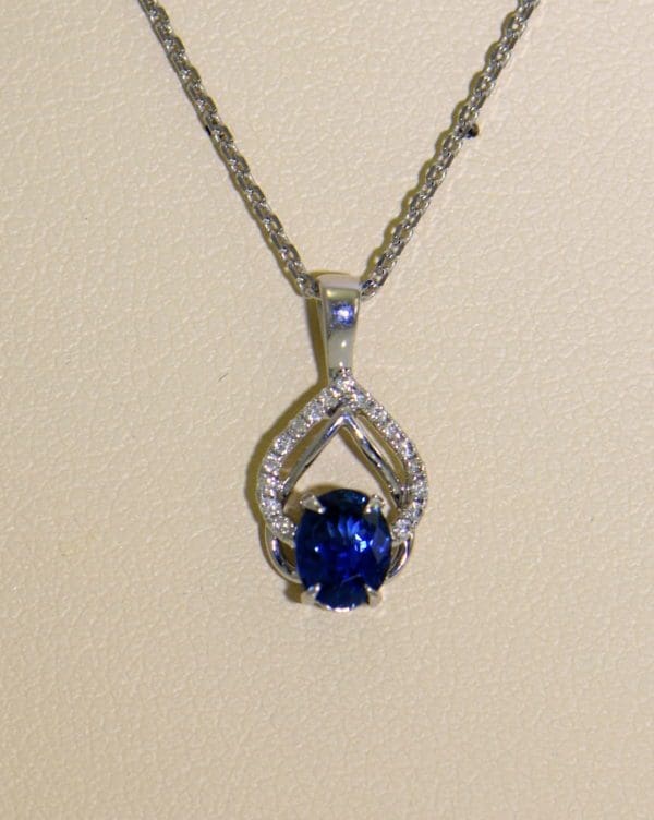 Dainty Blue Sapphire Diamond Embrace Pendant 4.JPG