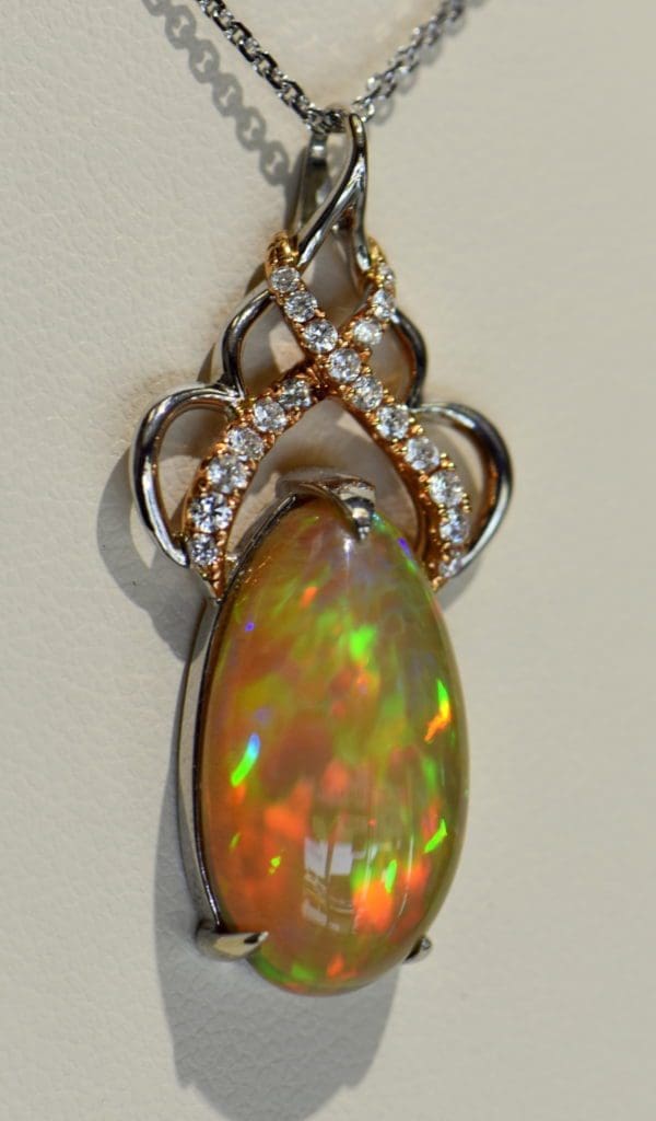 Ethiopian Crystal fire opal pendant with snakeskin pattern prismatic color rose gold 3.JPG