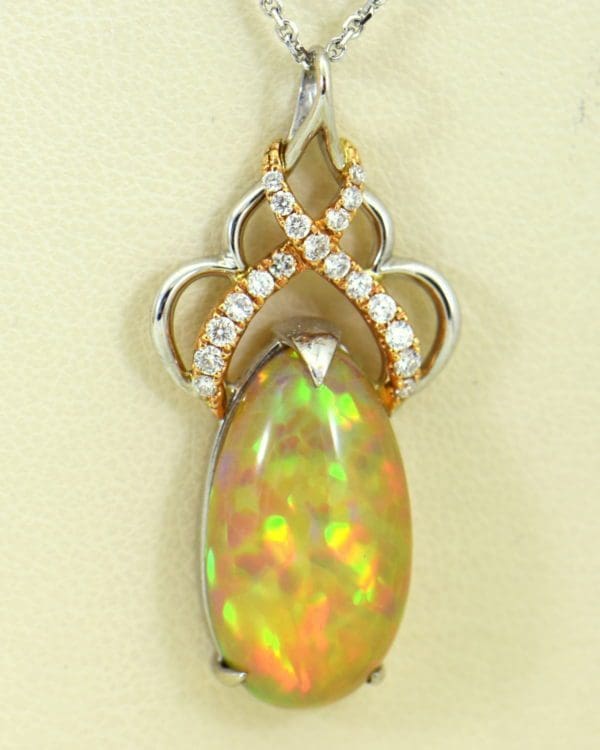 Ethiopian Opal Pendant In Twotone Gold with Snakeskin pattern.JPG