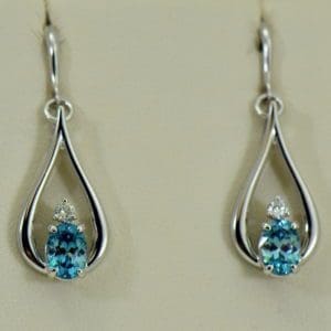 custom blue zircon and diamond dangle earrings 14kw.JPG