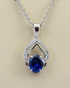 Dainty Blue Sapphire Diamond Embrace Pendant 5