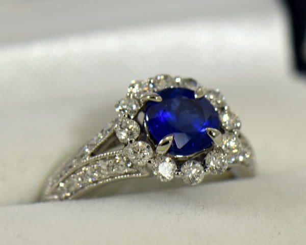 Round blue sapphire diamond halo engagement ring in white gold 2.JPG
