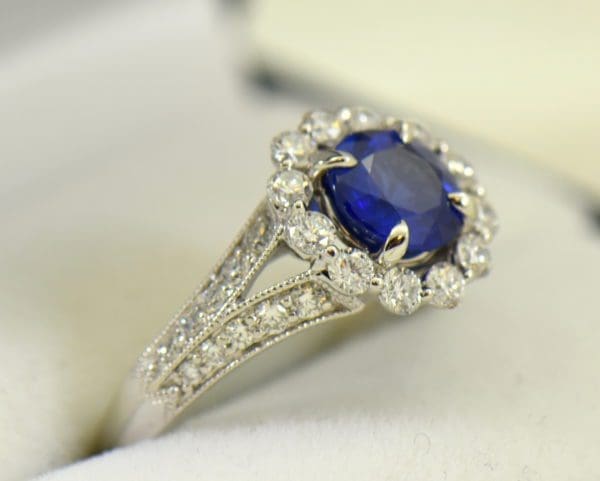 Round blue sapphire diamond halo engagement ring in white gold 3.JPG