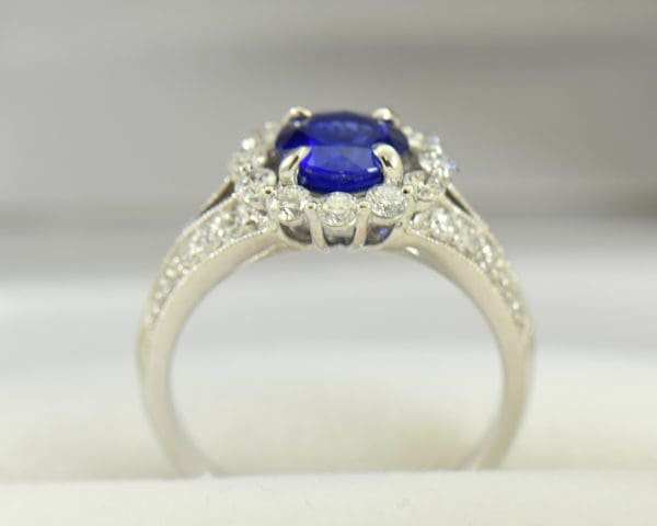 Round blue sapphire diamond halo engagement ring in white gold 4.JPG