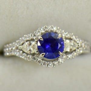 blue violet round sapphire and pear diamond engagement ring.JPG