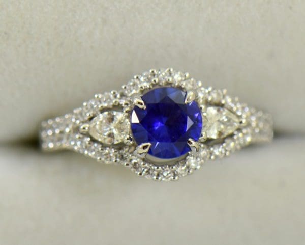 blue violet round sapphire and pear diamond engagement ring.JPG
