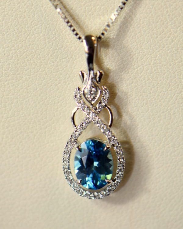 custom december birthstone blue zircon pendant in white gold.JPG