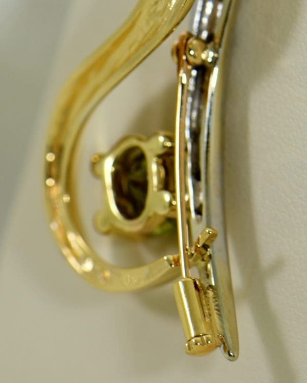 custom designed pin or pendant with sphene and yellow diamonds treble clef 4.JPG
