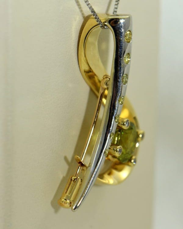 custom designed pin or pendant with sphene and yellow diamonds treble clef 5.JPG