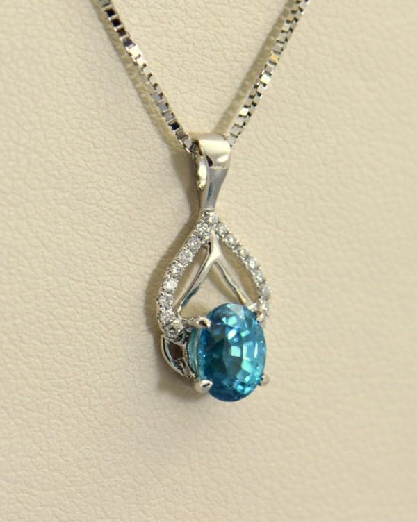 deep blue zircon pendant in white gold.JPG