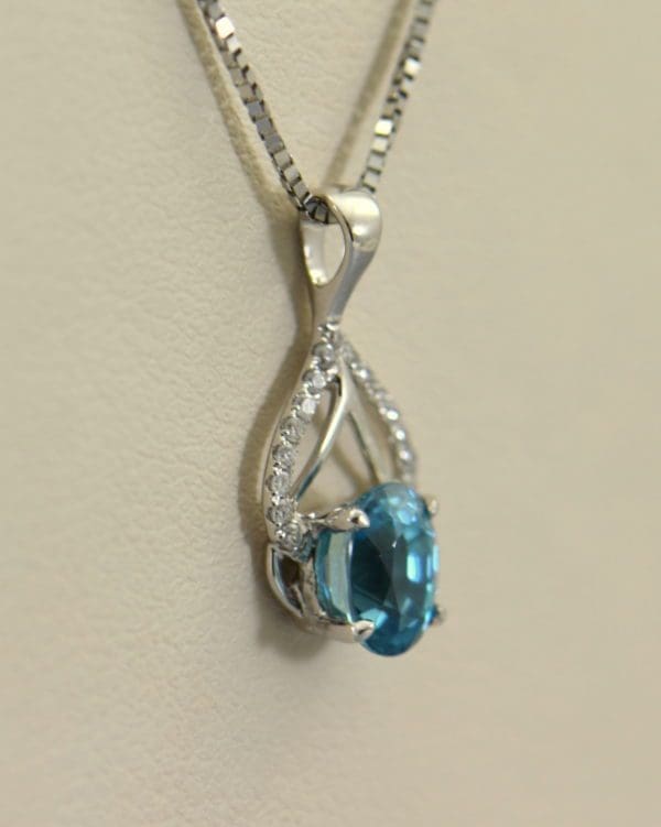 deep blue zircon pendant in white gold 3.JPG