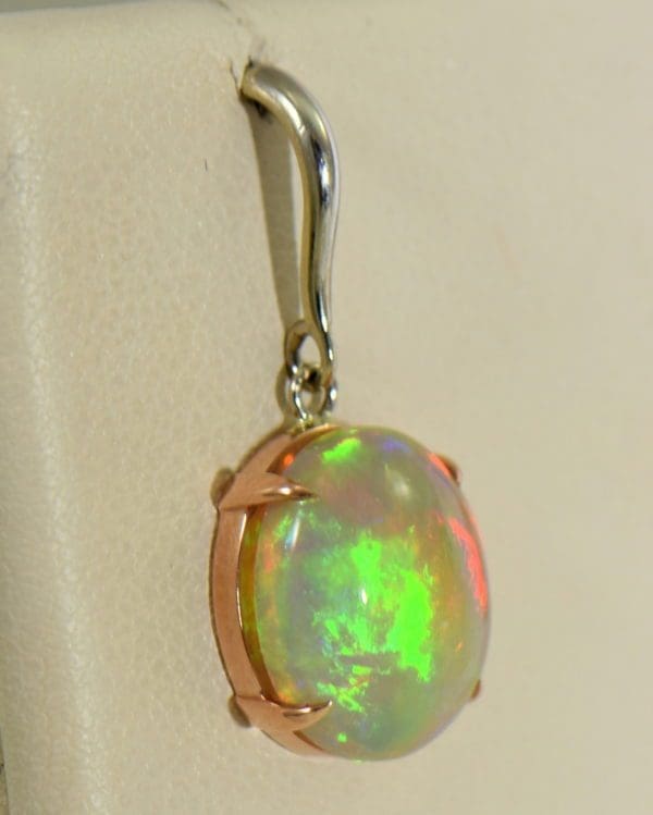 ethiopian opal earrings in rose and white gold 6.JPG