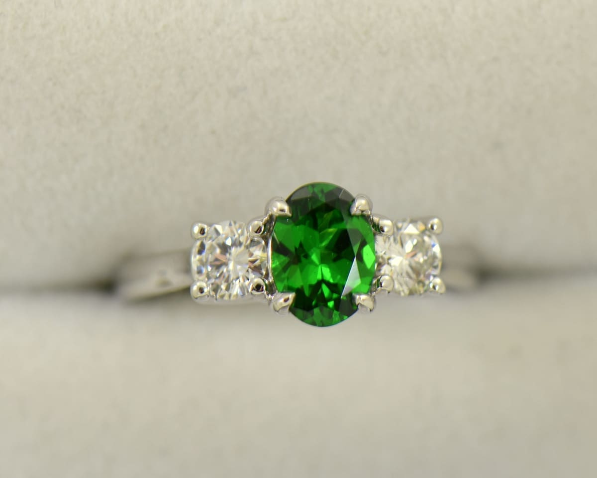 white gold three stone ring with diamonds and oval tsavorite green garnet 2.JPG