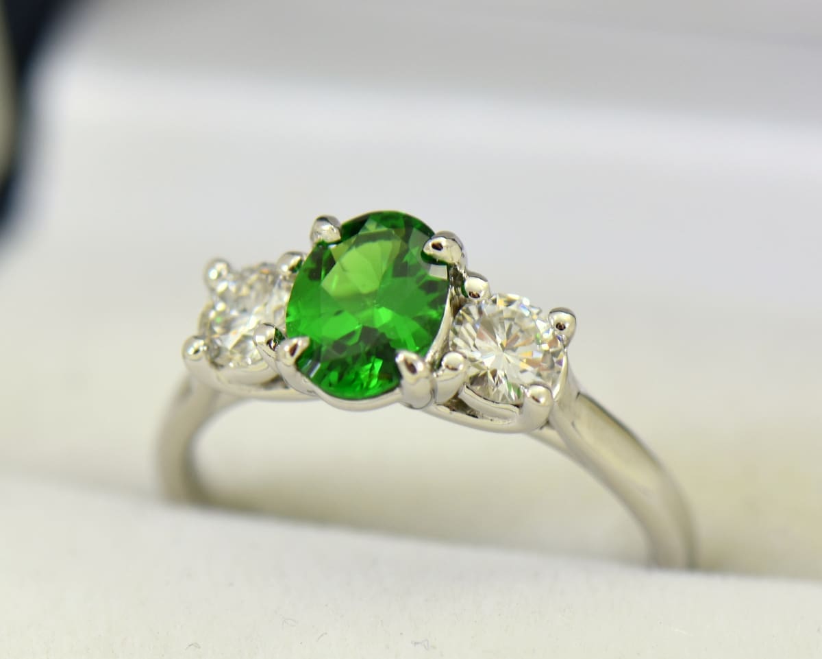 white gold three stone ring with diamonds and oval tsavorite green garnet 4.JPG