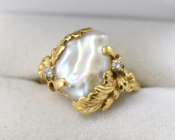1960s baroque pearl ring with gold leaves and diamond accent.JPG