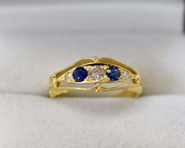antique 18k british wedding ring with sapphires and old euro cut diamonds.JPG