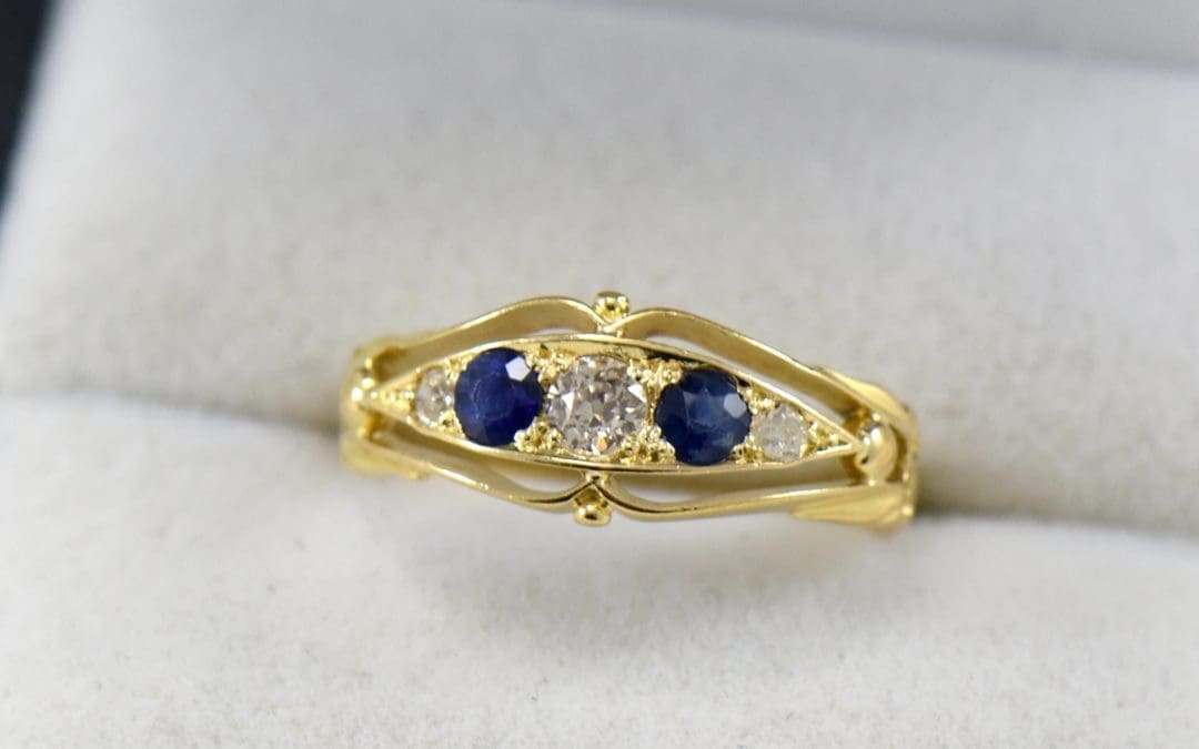 antique 18k british wedding ring with sapphires and old euro cut diamonds