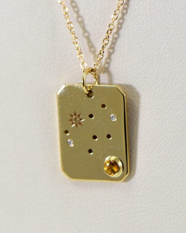 birth month constellation and birthstone pendant in yellow gold.JPG