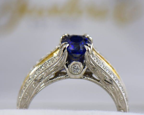 unheated royal blue sapphire ring with yellow and white diamond accents 4.JPG