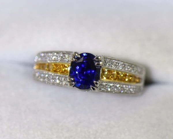 unheated royal blue sapphire ring with yellow and white diamond accents 6.JPG