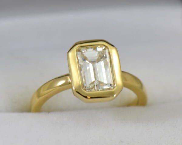 1.6ct emerald cut diamond in yellow gold bezel solitaire vs2 i GIA.JPG