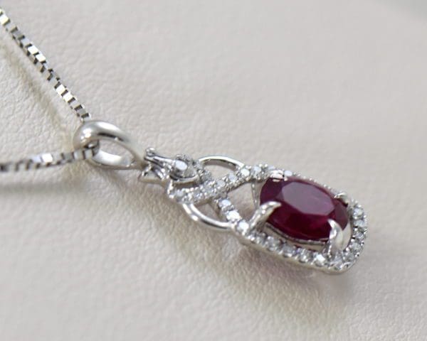 burmese ruby and diamond halo pendant in white gold 3.JPG