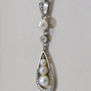 edwardian platinum over gold pearl pendant with mine cut diamond accents 4.JPG