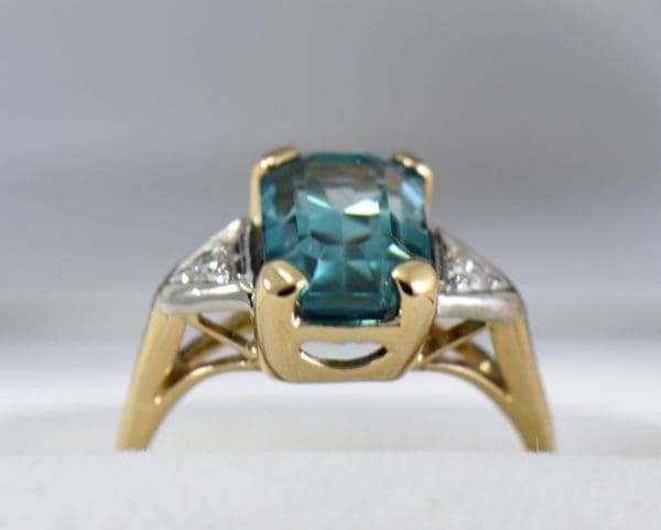 emerald cut blue zircon 3 stone ring in deco mounting 3.JPG